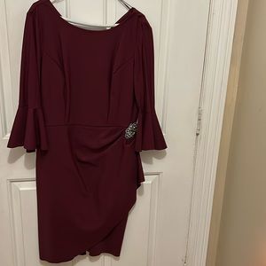 Maroon scuba knit fabric dress with silvertone ornament size 14